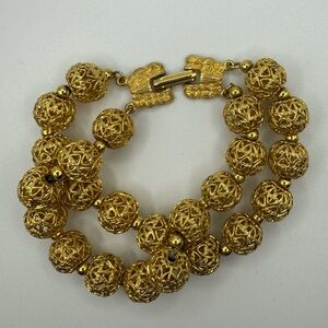Vintage gold tone woven sphere two strand bracelet